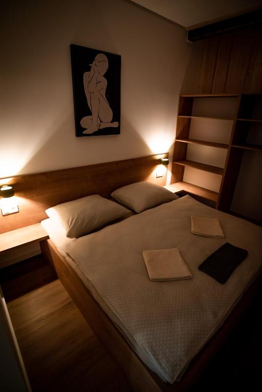 Postel nebo postele na pokoji v ubytování APART Mikeš