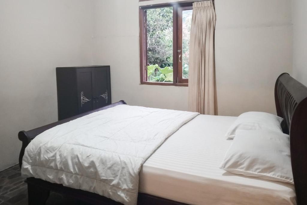 Villa d'Oasis 2 Puncak Mitra RedDoorz - Habitación De Lujo