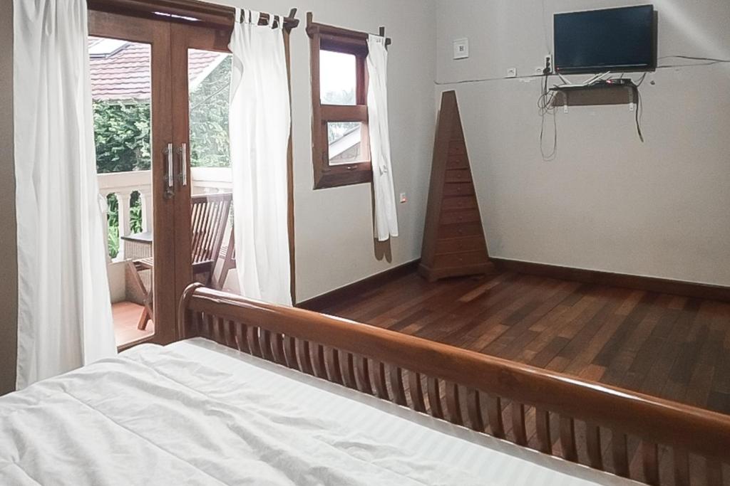 Villa d'Oasis 2 Puncak Mitra RedDoorz - Suite
