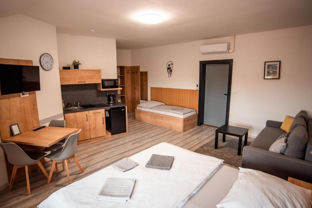 Postel nebo postele na pokoji v ubytování APART Mikeš