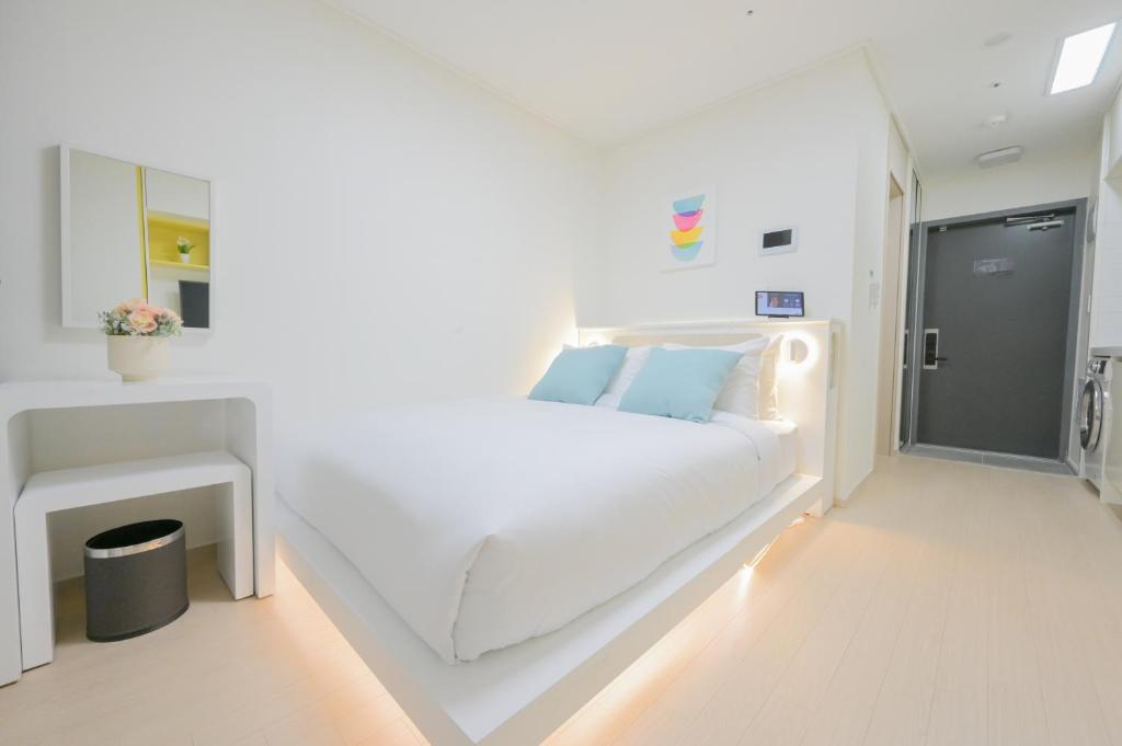 Letto o letti in una camera di E7 YANGYANG JUKDO