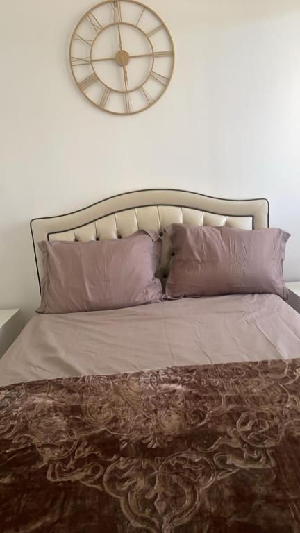 Una cama o camas en una habitaci&oacute;n de La rose de villepinte