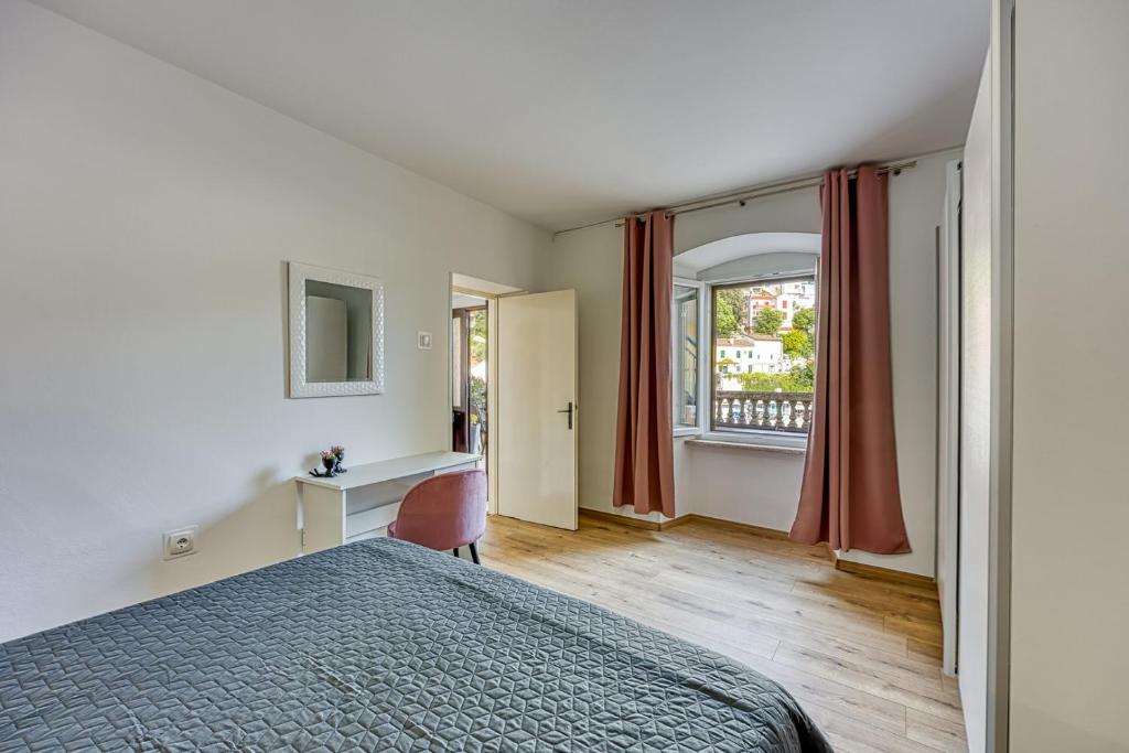 Postel nebo postele na pokoji v ubytování Apartment Riva 1001