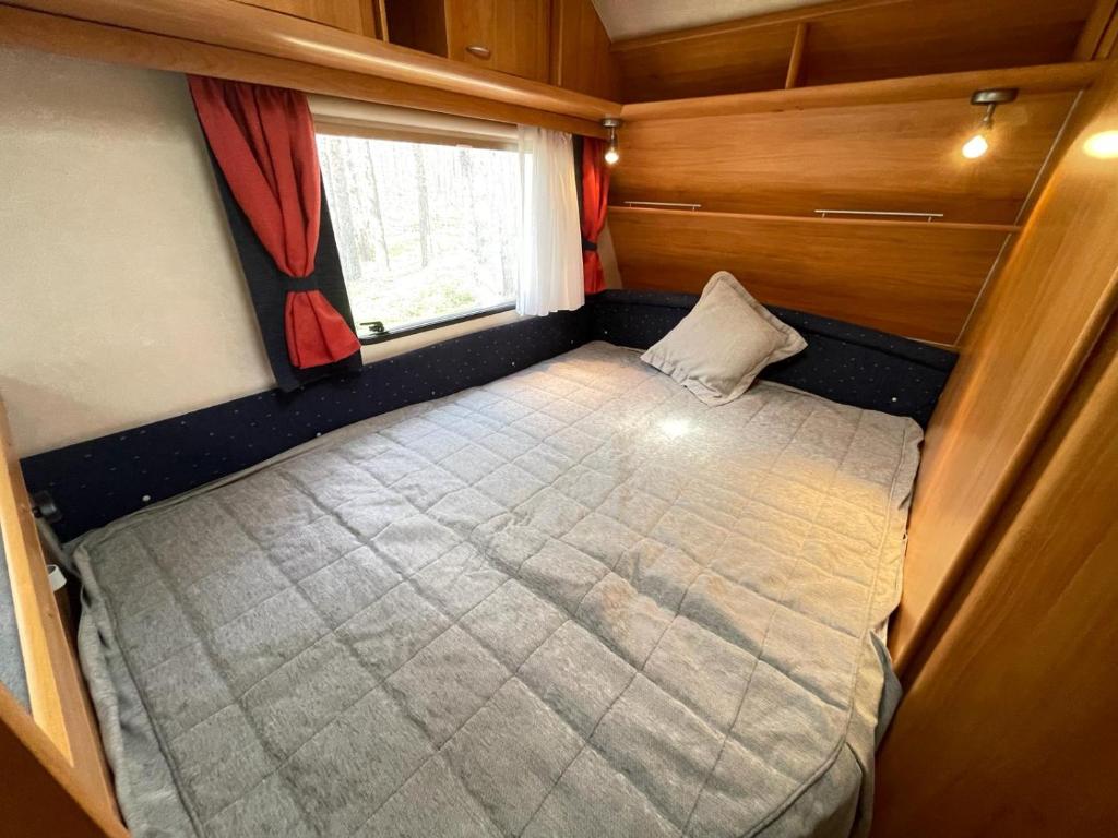 Postel nebo postele na pokoji v ubytování Your Camp Hel