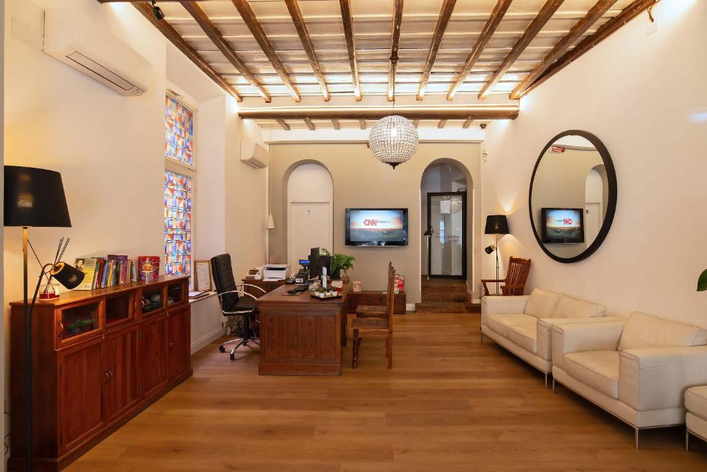 TV a/nebo společenská místnost v ubytování Hotel Elite