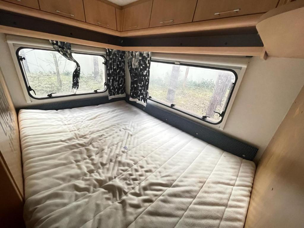 Postel nebo postele na pokoji v ubytování Your Camp Hel
