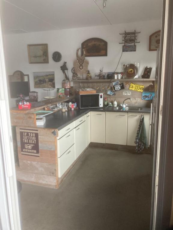 Kuchyň nebo kuchyňský kout v ubytování Bed & Breakfast ‘t Westergouwertje