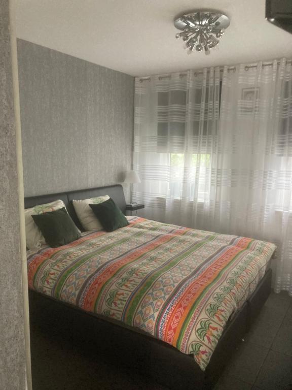 Postel nebo postele na pokoji v ubytování Bed & Breakfast ‘t Westergouwertje