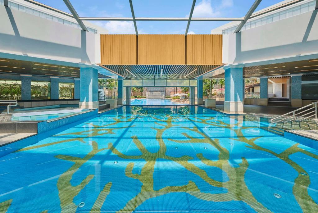 Bazén v ubytování Hilton Guangzhou Science City, Free Shuttle Bus during Canton Fair nebo v jeho okolí