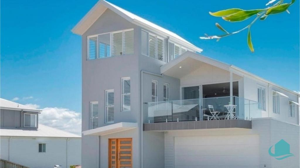 a rendering of a house with a kite at Beachside Oasis in Caves Beach
