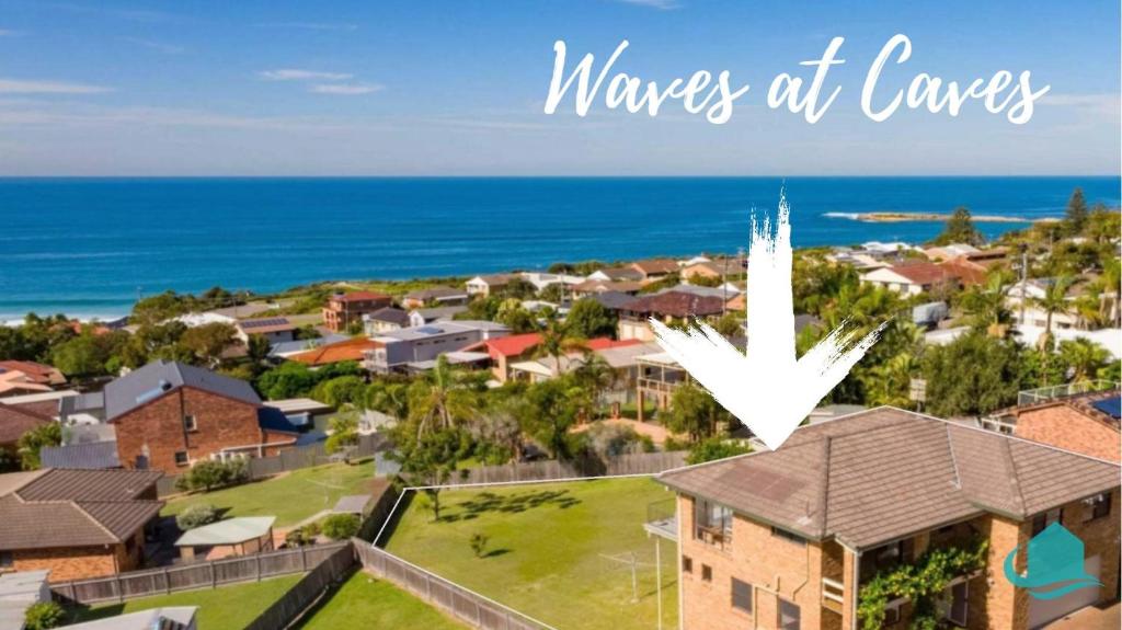 an image of a suburb with the words moms at cancer at Waves at Caves in Caves Beach