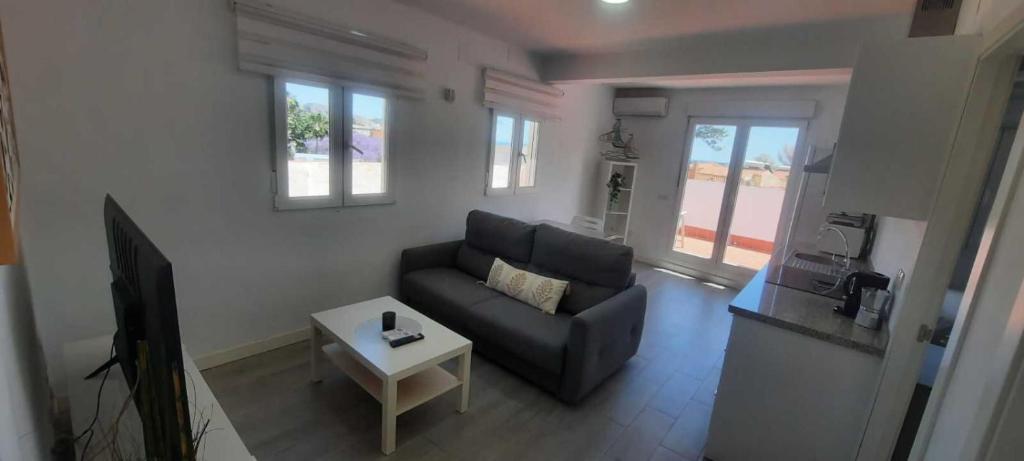 Posedenie v ubytovaní Atico con terraza Frente Playa Pedregalejo