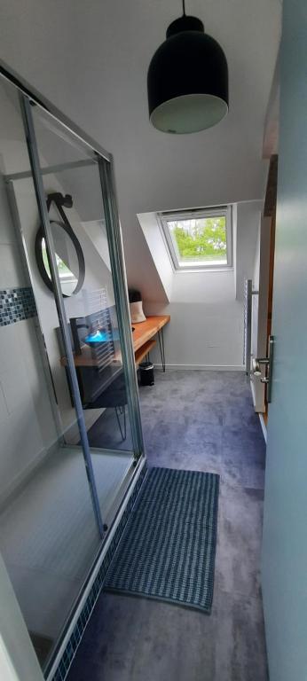 Postel nebo postele na pokoji v ubytování L'EAU QUI DORT - Chambres et Tables d'hôtes