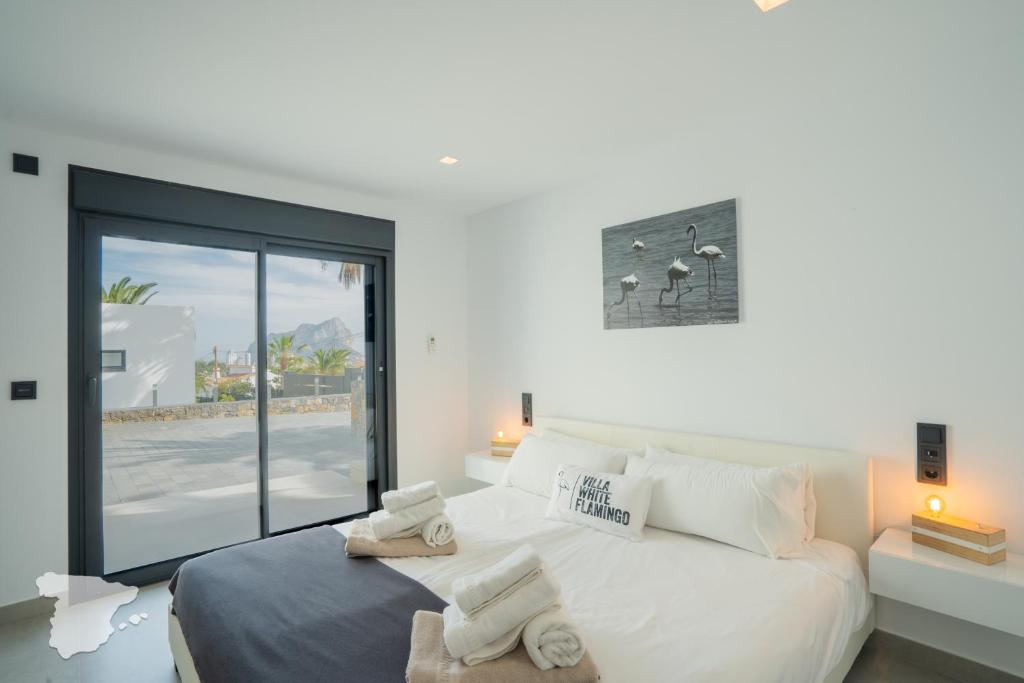 Postel nebo postele na pokoji v ubytování CostaBlancaDreams Villa White Flamingo in Calpe