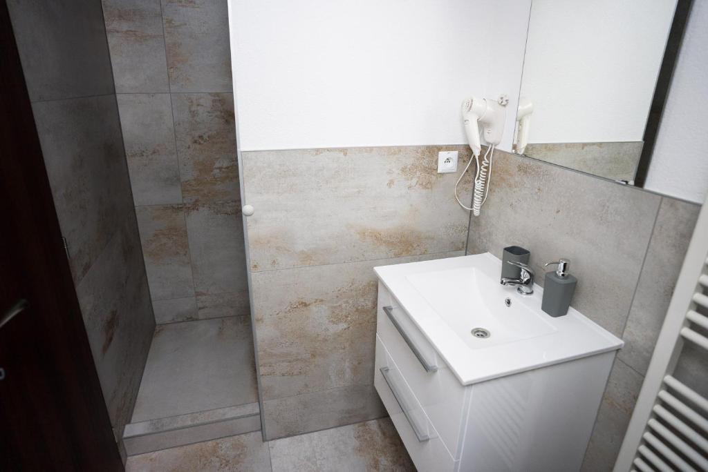 Koupelna v ubytování Apartmány Banff