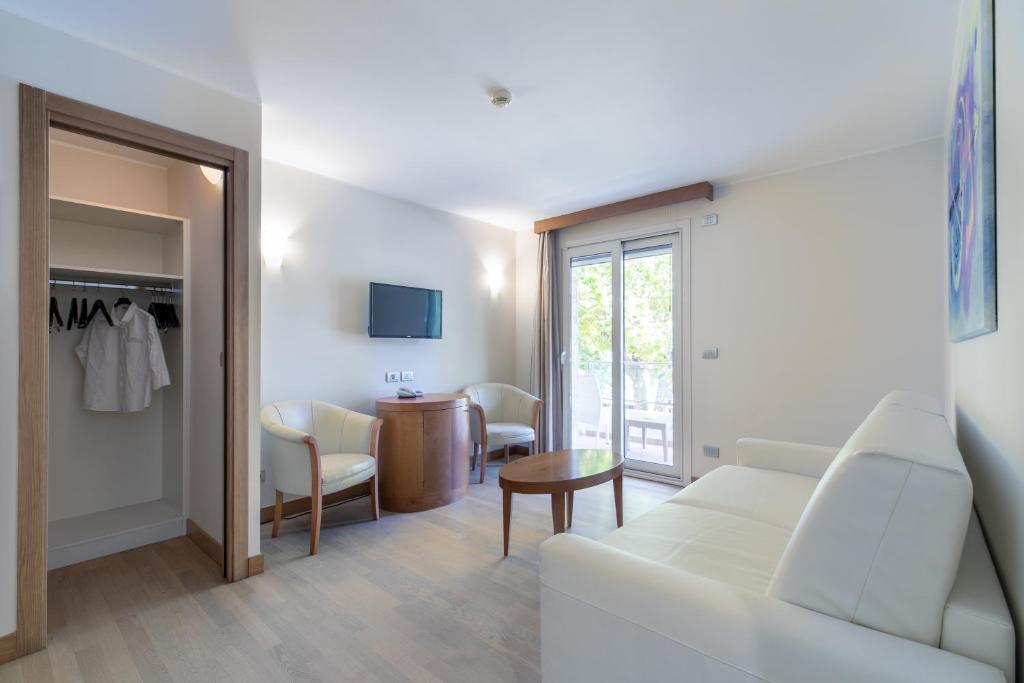 TV a/nebo společenská místnost v ubytování Hotel Villa Doimo