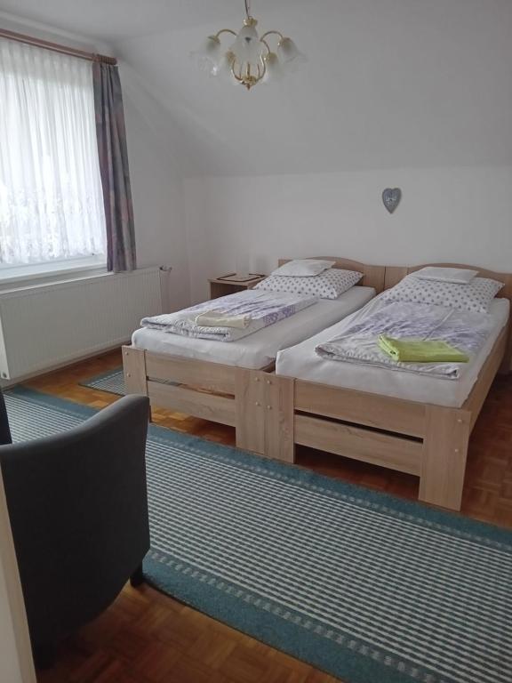 Postel nebo postele na pokoji v ubytování Pension Kristýna
