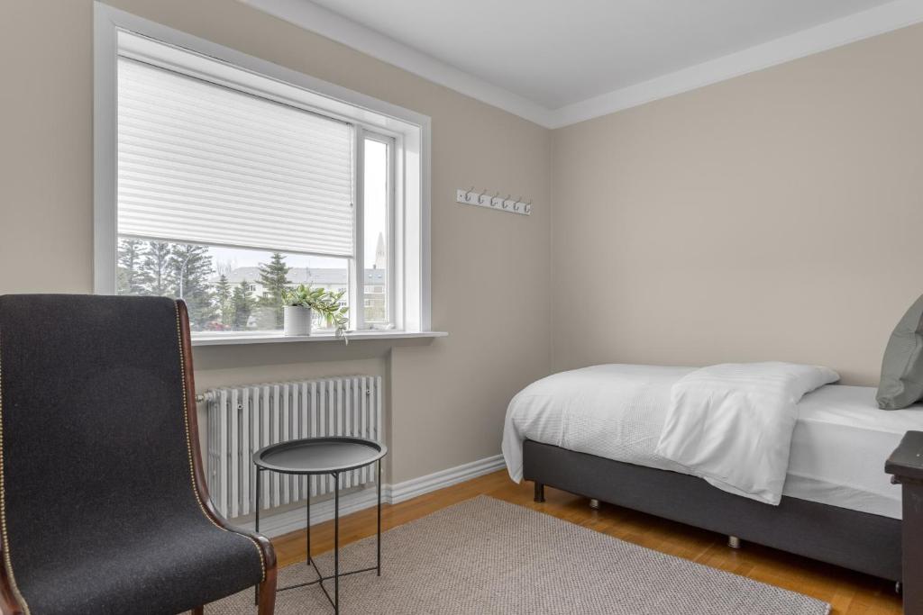 Postel nebo postele na pokoji v ubytování Audur Guesthouse