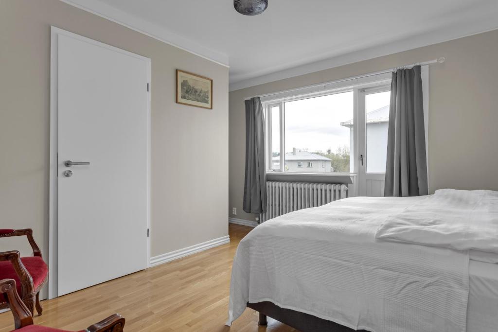Postel nebo postele na pokoji v ubytování Audur Guesthouse