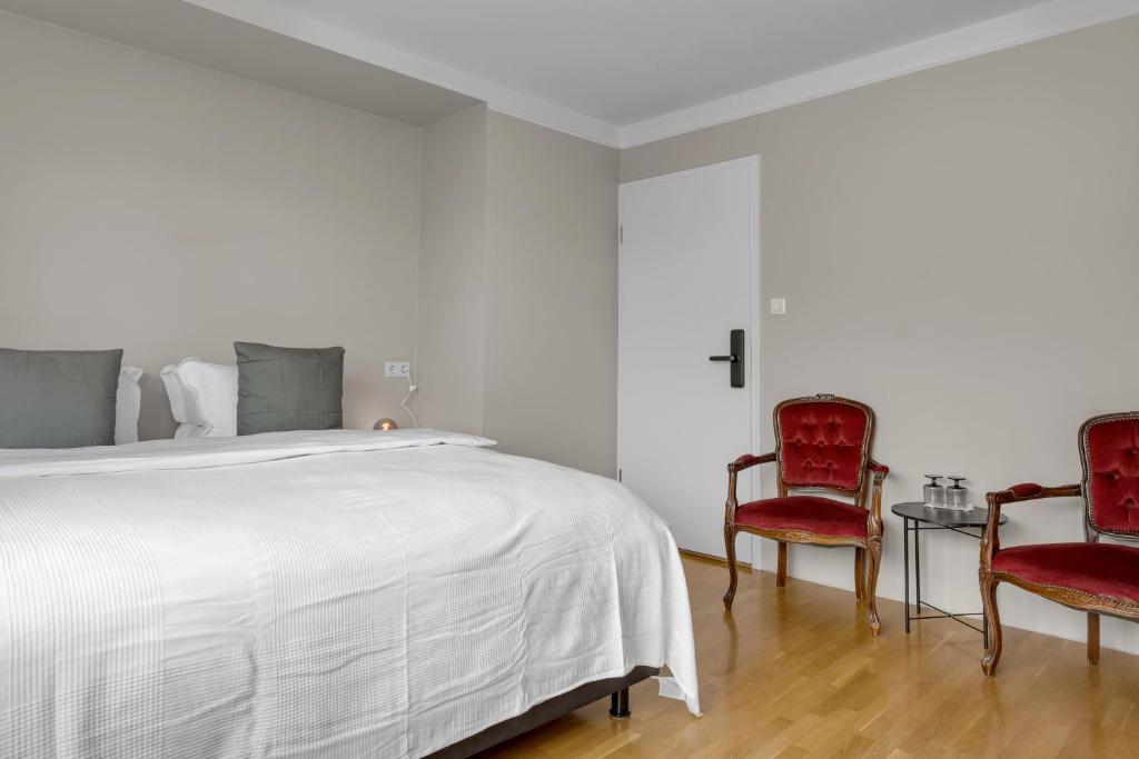 Postel nebo postele na pokoji v ubytování Audur Guesthouse