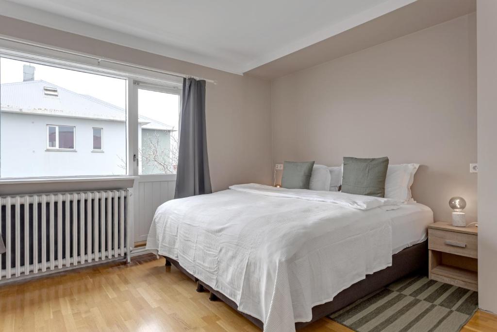 Postel nebo postele na pokoji v ubytování Audur Guesthouse
