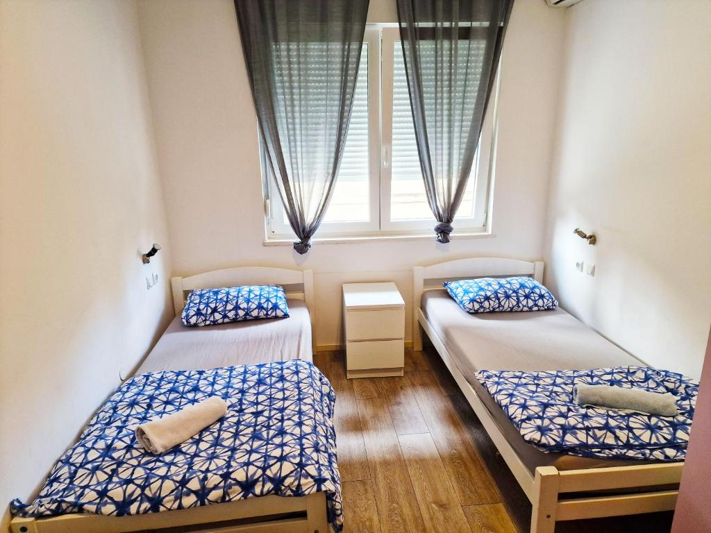 Postel nebo postele na pokoji v ubytování Croparadise Hostel