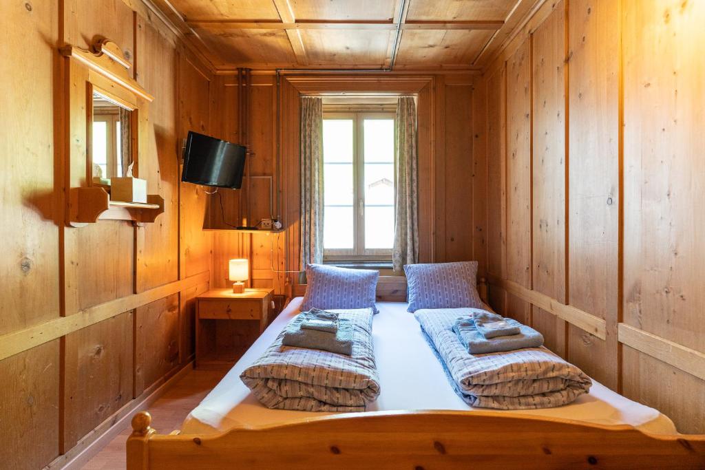 Postel nebo postele na pokoji v ubytování Gasthaus Edelweiss