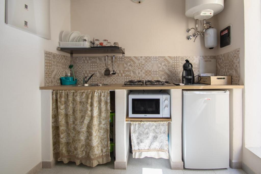 Kuchyň nebo kuchyňský kout v ubytování DUCEZIO rooms