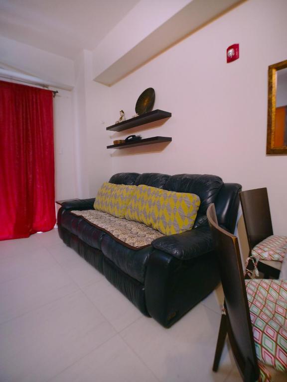 Posezení v ubytování Pico De Loro Condo Unit