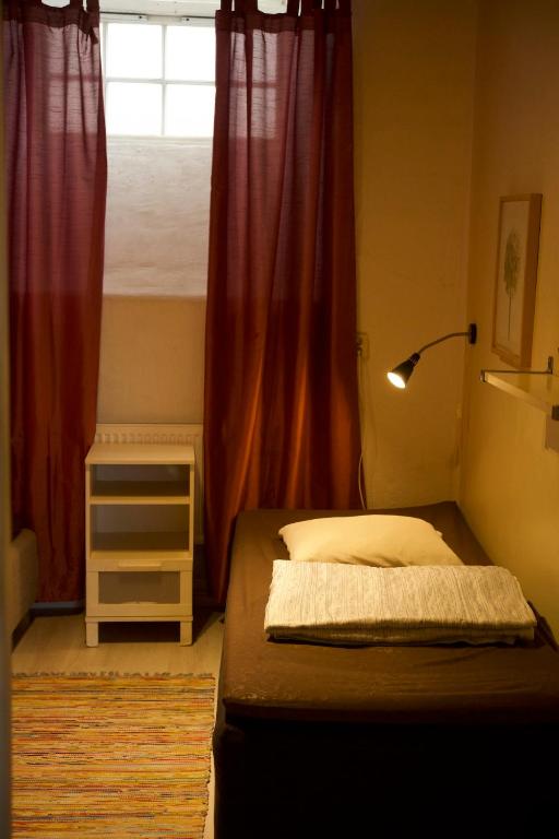 Postel nebo postele na pokoji v ubytování Dockside Hostel
