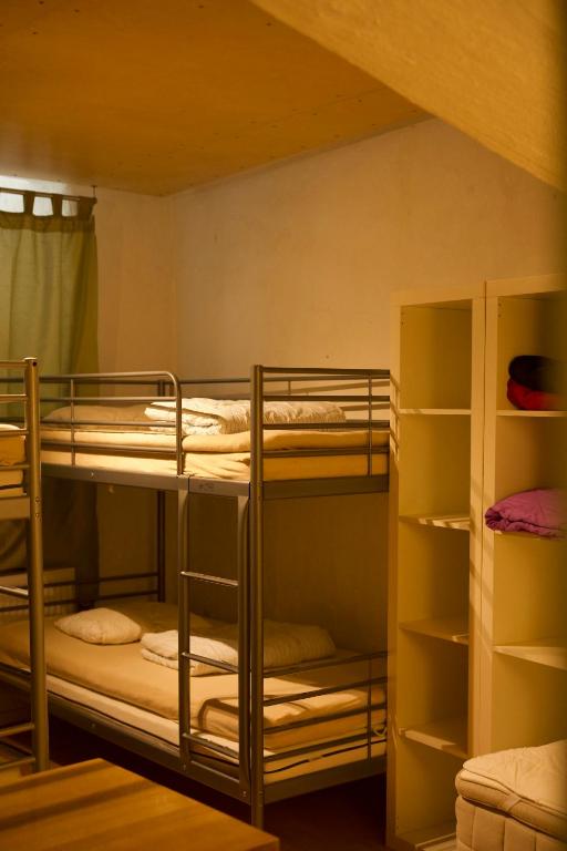 Postel nebo postele na pokoji v ubytování Dockside Hostel