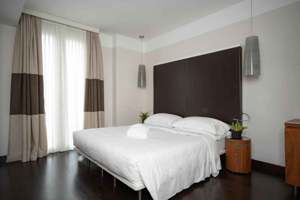 Postel nebo postele na pokoji v ubytování Best Western Plus Hotel De Capuleti