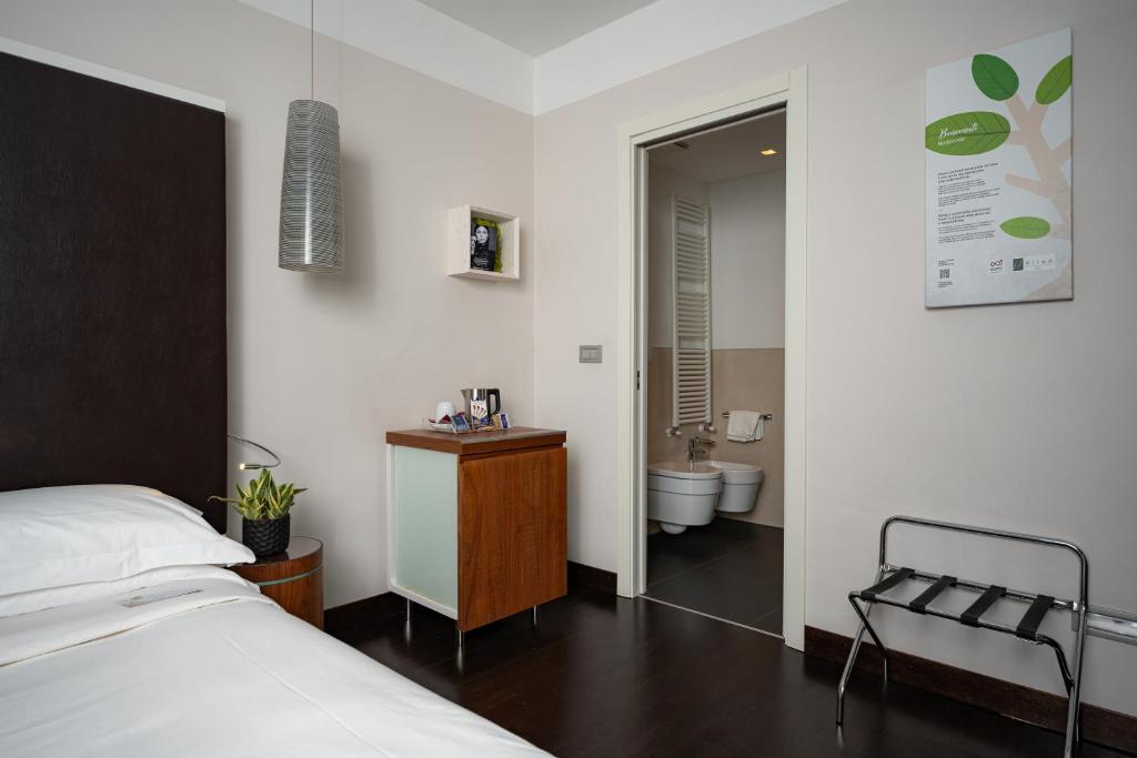 Postel nebo postele na pokoji v ubytování Best Western Plus Hotel De Capuleti