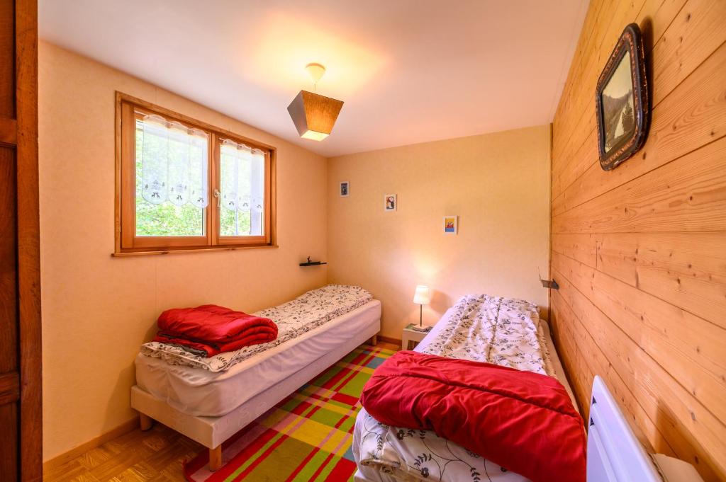 Postel nebo postele na pokoji v ubytování Chalet Du Wason
