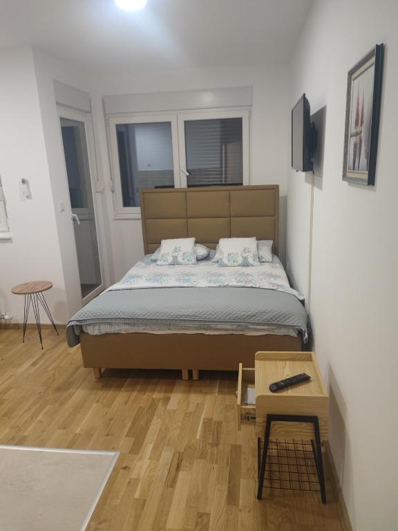 Postel nebo postele na pokoji v ubytování Nirvana SPA Center