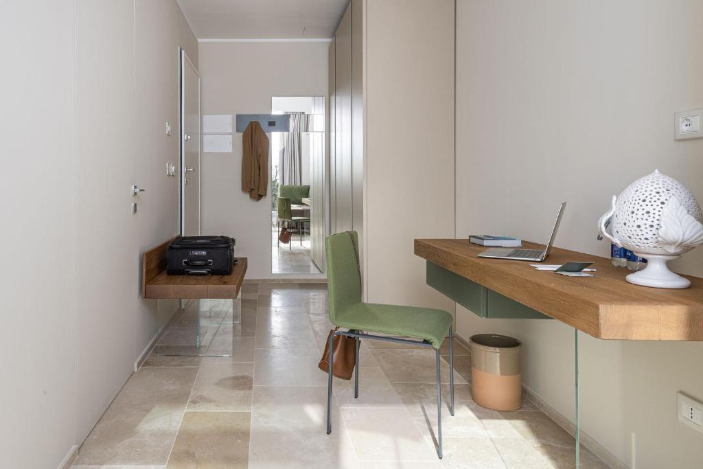 TV a/nebo společenská místnost v ubytování Torre Assunta Hotel