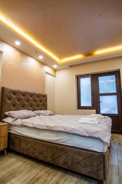 Una cama o camas en una habitación de Šumska kuća Divčibare