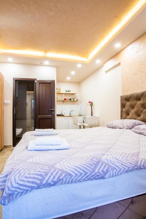 Una cama o camas en una habitación de Šumska kuća Divčibare