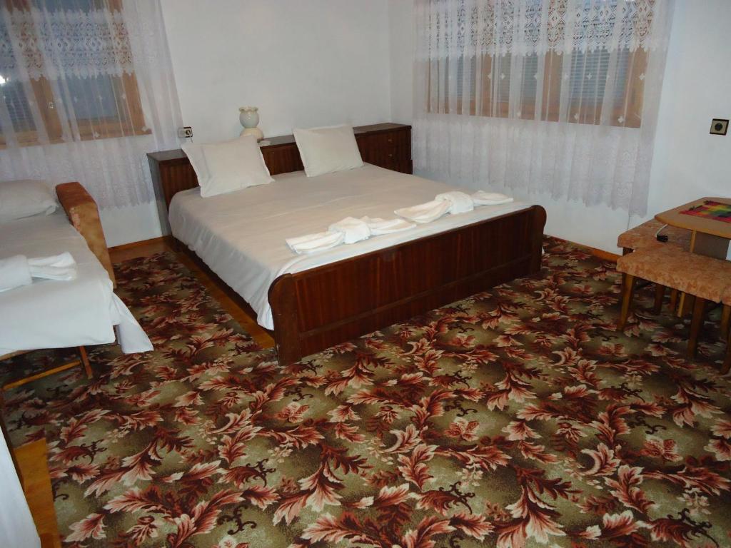Postel nebo postele na pokoji v ubytování Guest House AHP
