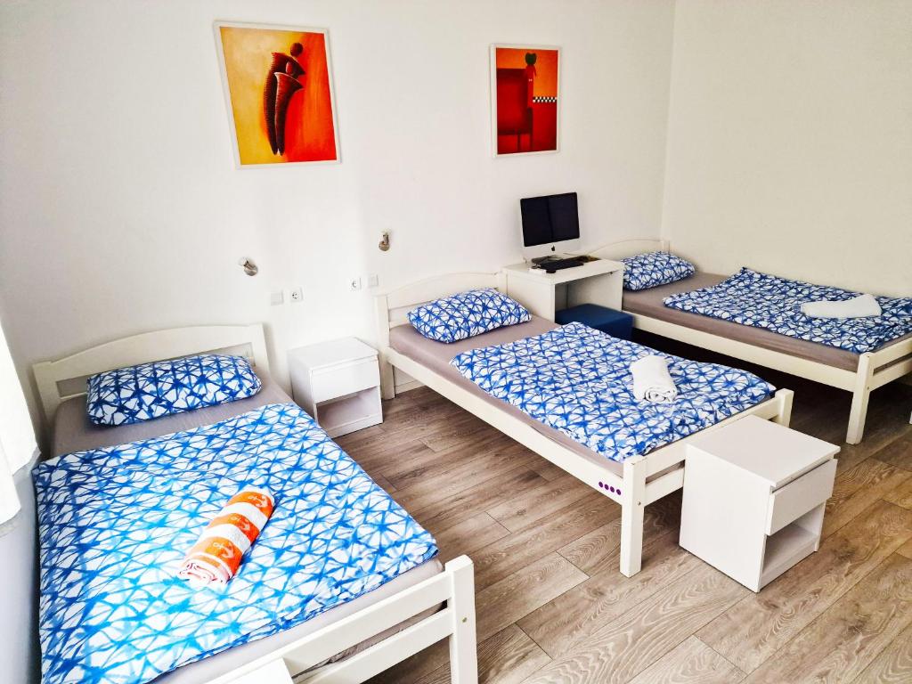 Postel nebo postele na pokoji v ubytování Croparadise Hostel