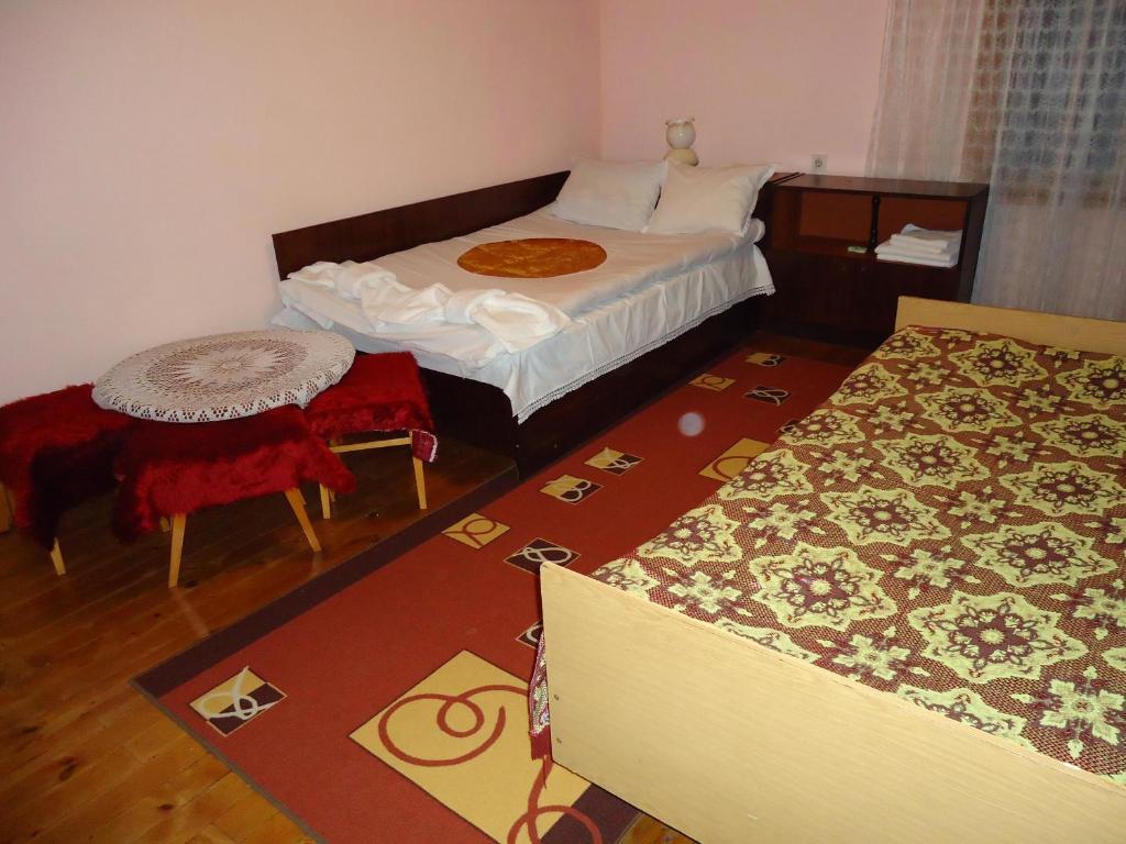 Postel nebo postele na pokoji v ubytování Guest House AHP