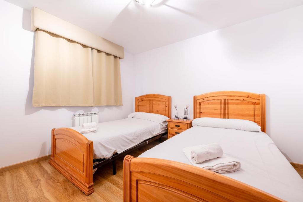 Postel nebo postele na pokoji v ubytování Apartamento EL RIU en Arinsal