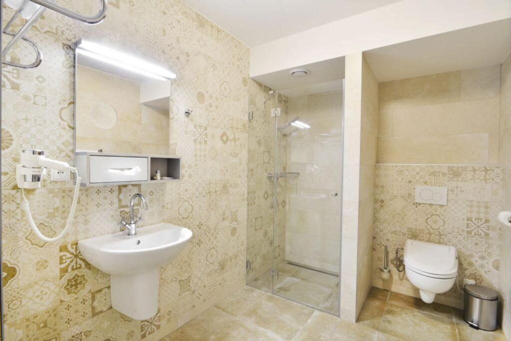 Koupelna v ubytování Hotel Anno