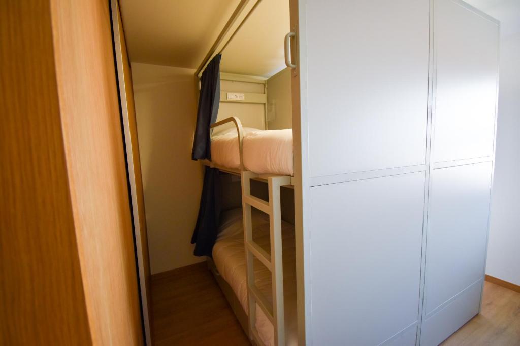 Postel nebo postele na pokoji v ubytování Lindo Vale 412