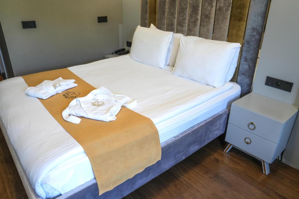 Postel nebo postele na pokoji v ubytování Vital Thermal Hotel & SPA