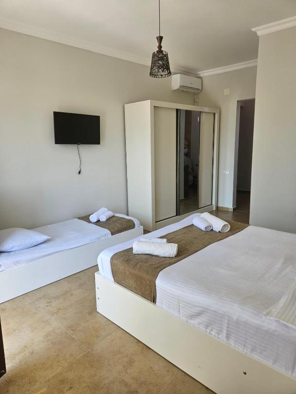 Postel nebo postele na pokoji v ubytování Guest House Gio