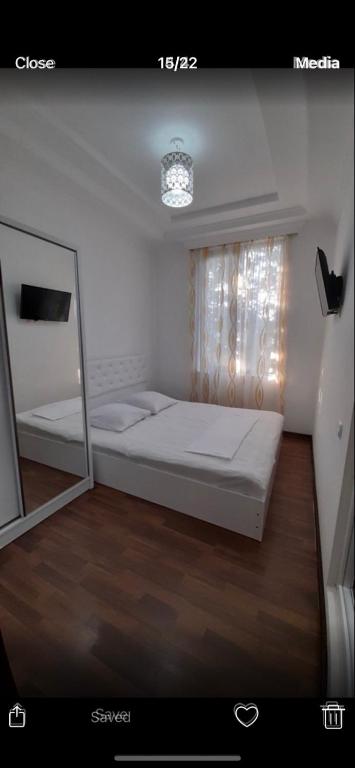 Postel nebo postele na pokoji v ubytování Guest House Gio