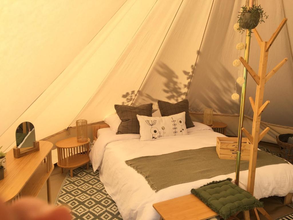 Postel nebo postele na pokoji v ubytování Camping Le Gerrit