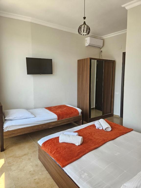 Postel nebo postele na pokoji v ubytování Guest House Gio