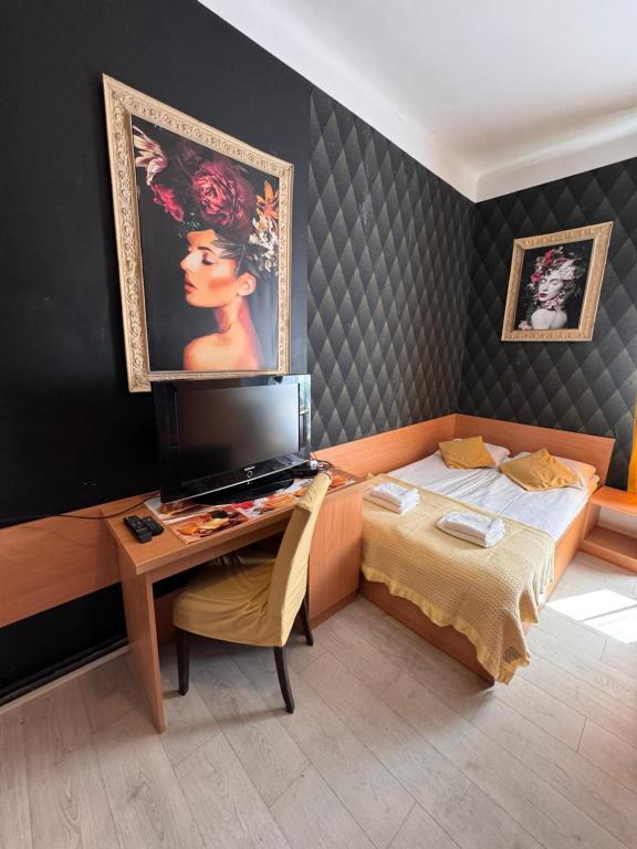 Cama ou camas em um quarto em Apartamenty Stary Rynek 18